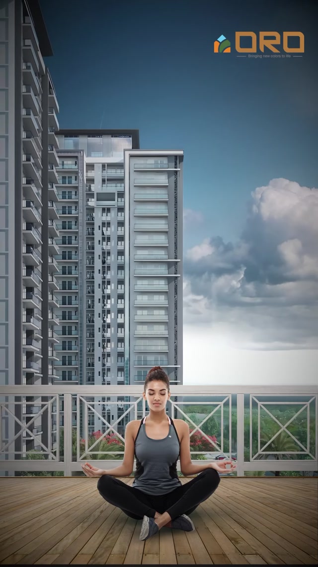 A woman practicing yoga on a balcony with a modern high-rise residential apartment building in the background, promoting International Yoga Day at ORO Group.